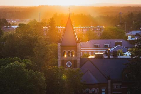 Thompson Hall's spire in misty bright sunlight